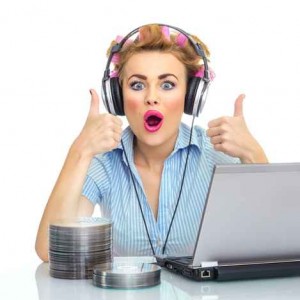 Happy woman listening to music on her headphones